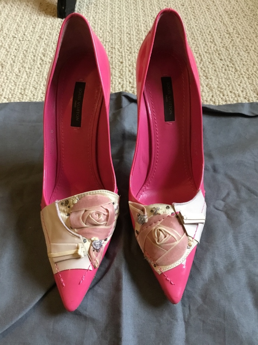 Louis Vuitton patent leather pump with floral appliqué detailing